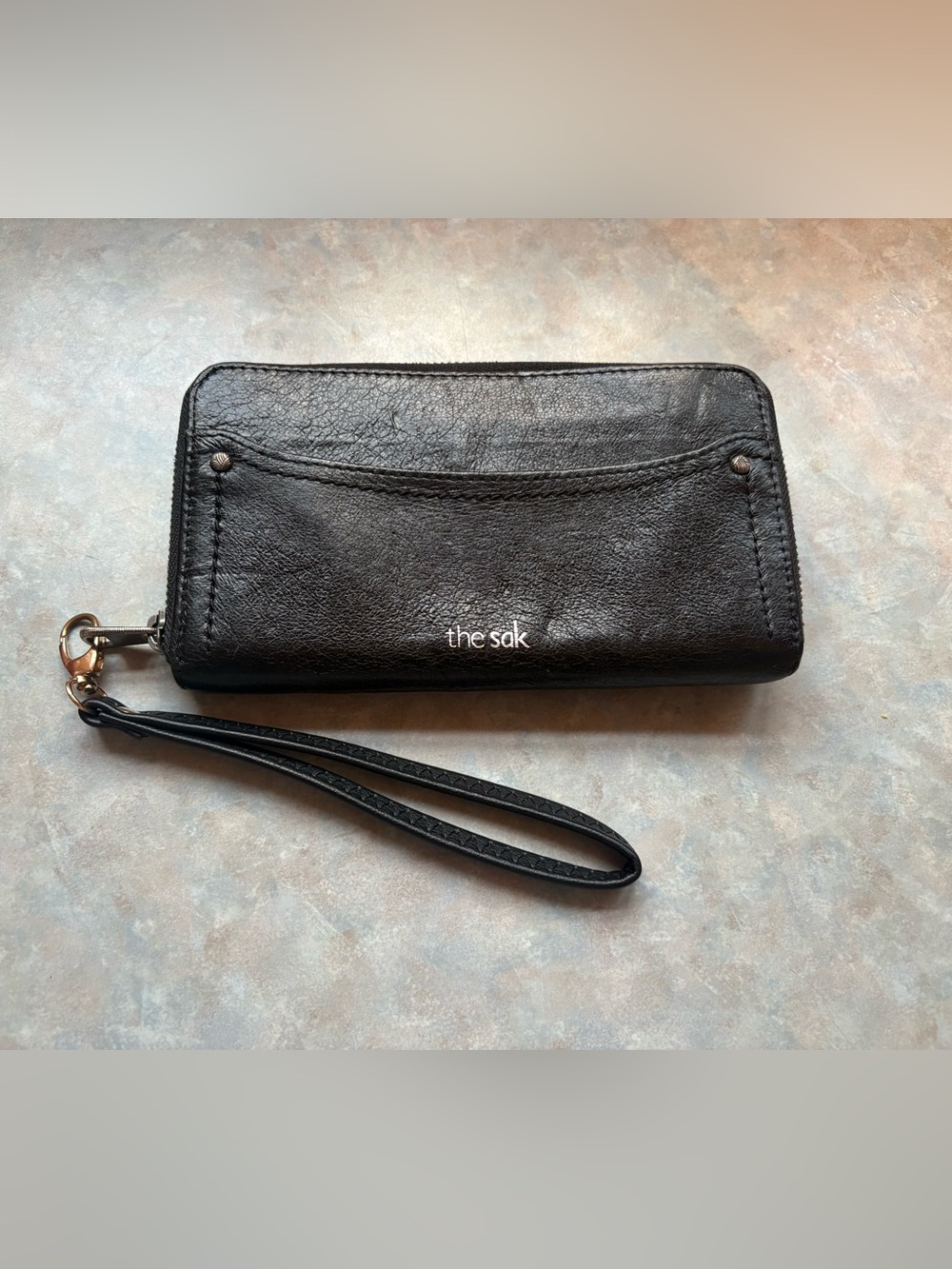 The Sak Black Leather Zip Wristlet with Front Pocket